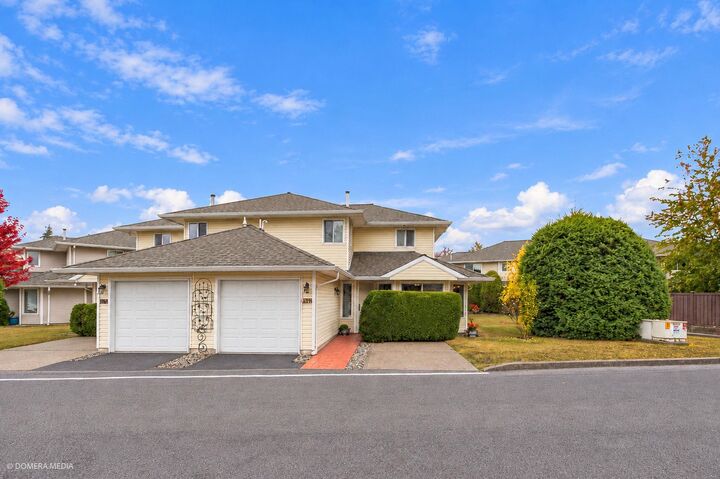 Property Photo:  21928 48th Avenue 114  BC V3A 8H1 