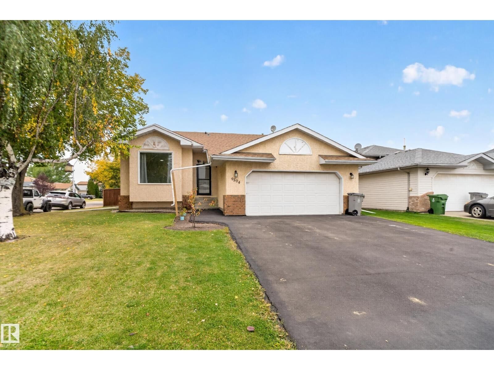 Property Photo:  9504 95 St SE  AB T8R 1K9 