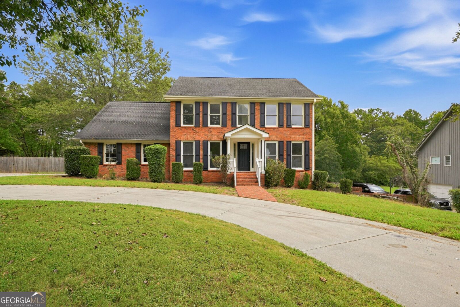 Property Photo:  1502 Shoal Creek Drive SW  GA 30094 