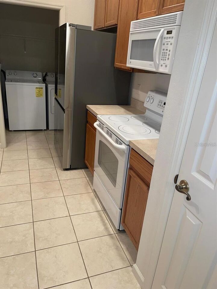 Property Photo:  3025 Greystone Loop 208  FL 34741 
