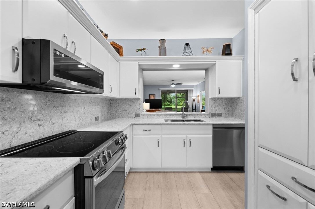 Property Photo:  14580 Daffodil Drive 703  FL 33919 