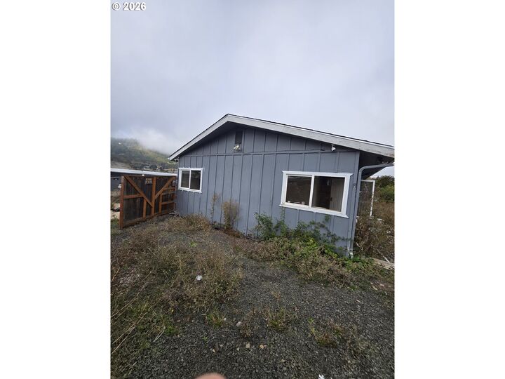 Property Photo:  3612 NW Joseph St  OR 97470 