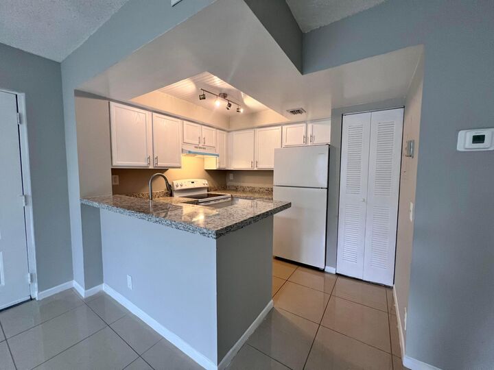 Property Photo:  700 Executive Center Drive 211  FL 33401 