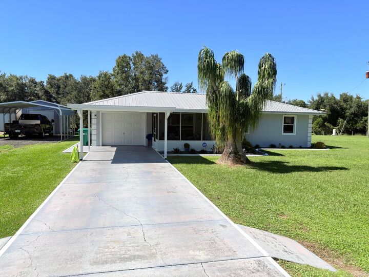 Property Photo:  6012 SE 30th Parkway  FL 34974 