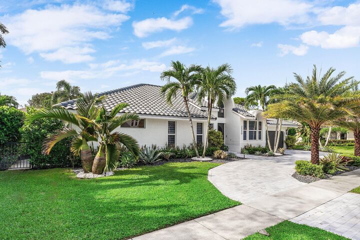 Property Photo:  2550 NW 28th Street  FL 33434 