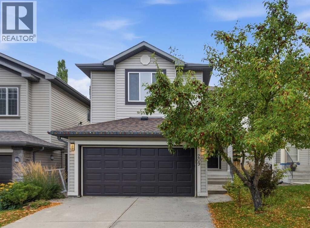 Property Photo:  209 Tuscany Ravine Road Northwest  AB T3L 2W9 
