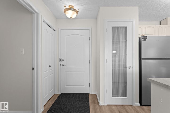 Property Photo:  2420 108 Street NW 207  AB T6J 7J3 