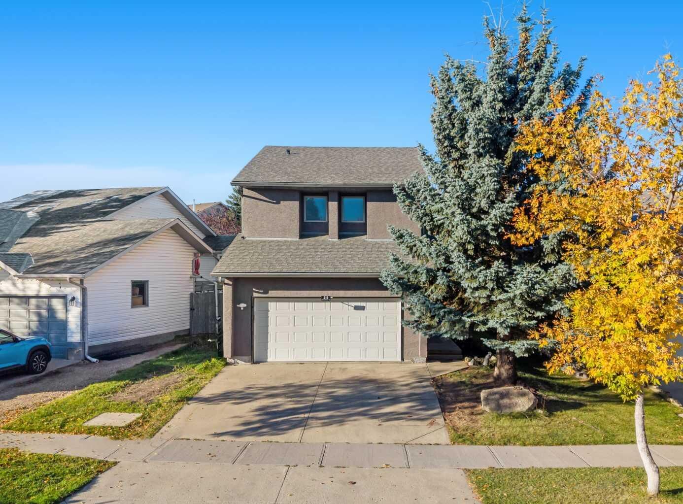Property Photo: 25 Sheep River Drive AB T1S 1N5