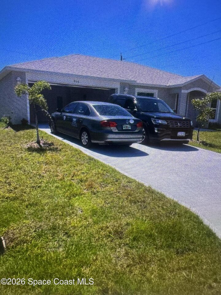 Property Photo: 906 Wheatley Street SE FL 32909