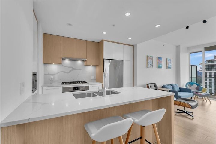 Property Photo: 567 Clarke Road 3305 BC V3J 0K7