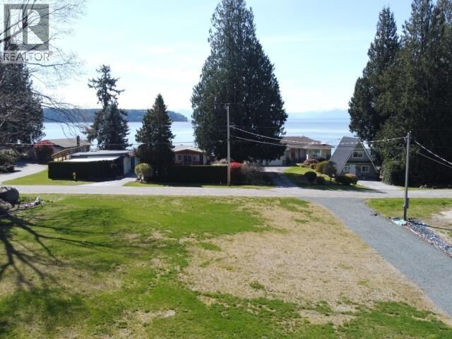 Property Photo:  6900 Klahanie Drive  BC V8A 1V9 
