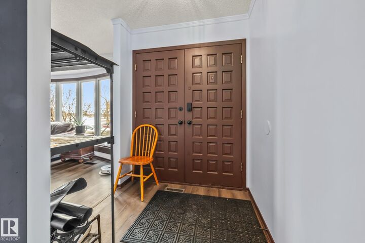 Property Photo:  8812 135 Avenue NW  AB T5E 1N3 