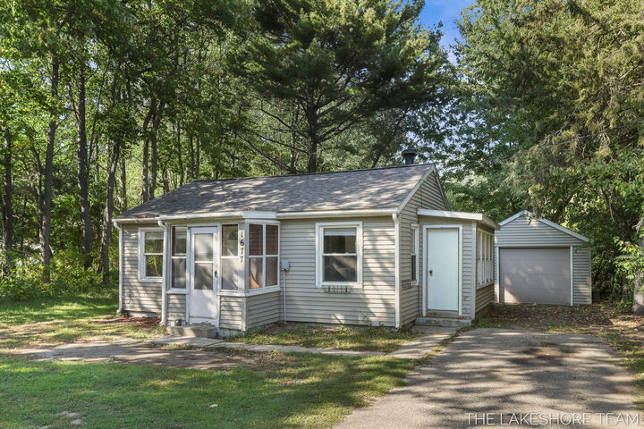 Property Photo:  1677 W Lakewood Boulevard  MI 49424 