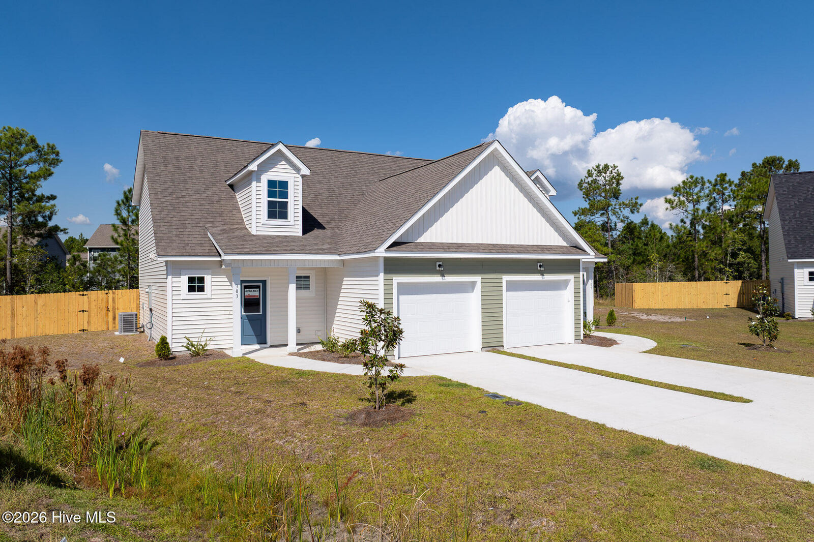 Property Photo:  303 Coastal Reef Court  NC 28445 
