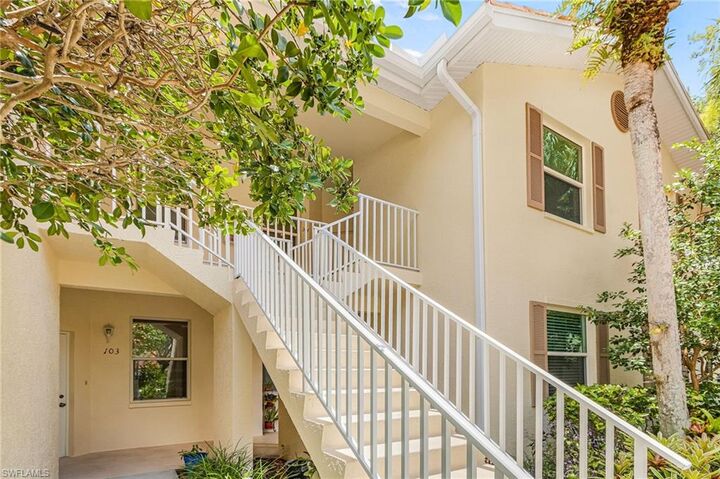 Property Photo:  305 Robin Hood Cir 204  FL 34104 