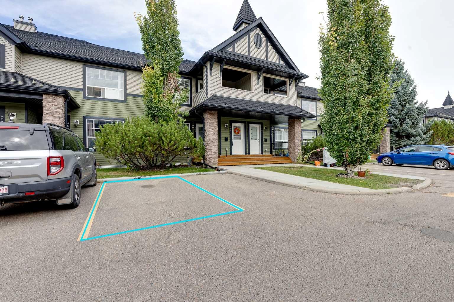 Property Photo: 140 Sagewood Boulevard SW 406 AB T4B 3H5