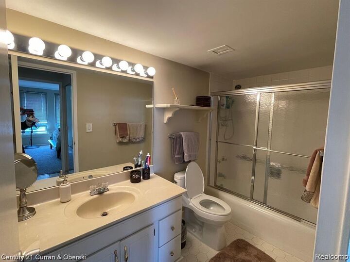 Property Photo: 22700 Garrison Street 1004 MI 48124