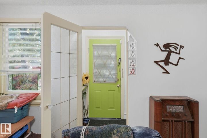 Property Photo:  9628 100A Street NW  AB T5K 0V8 