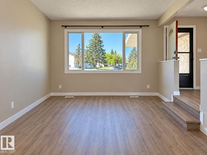Property Photo:  10439 36A Ave NW  AB T6J 2H7 