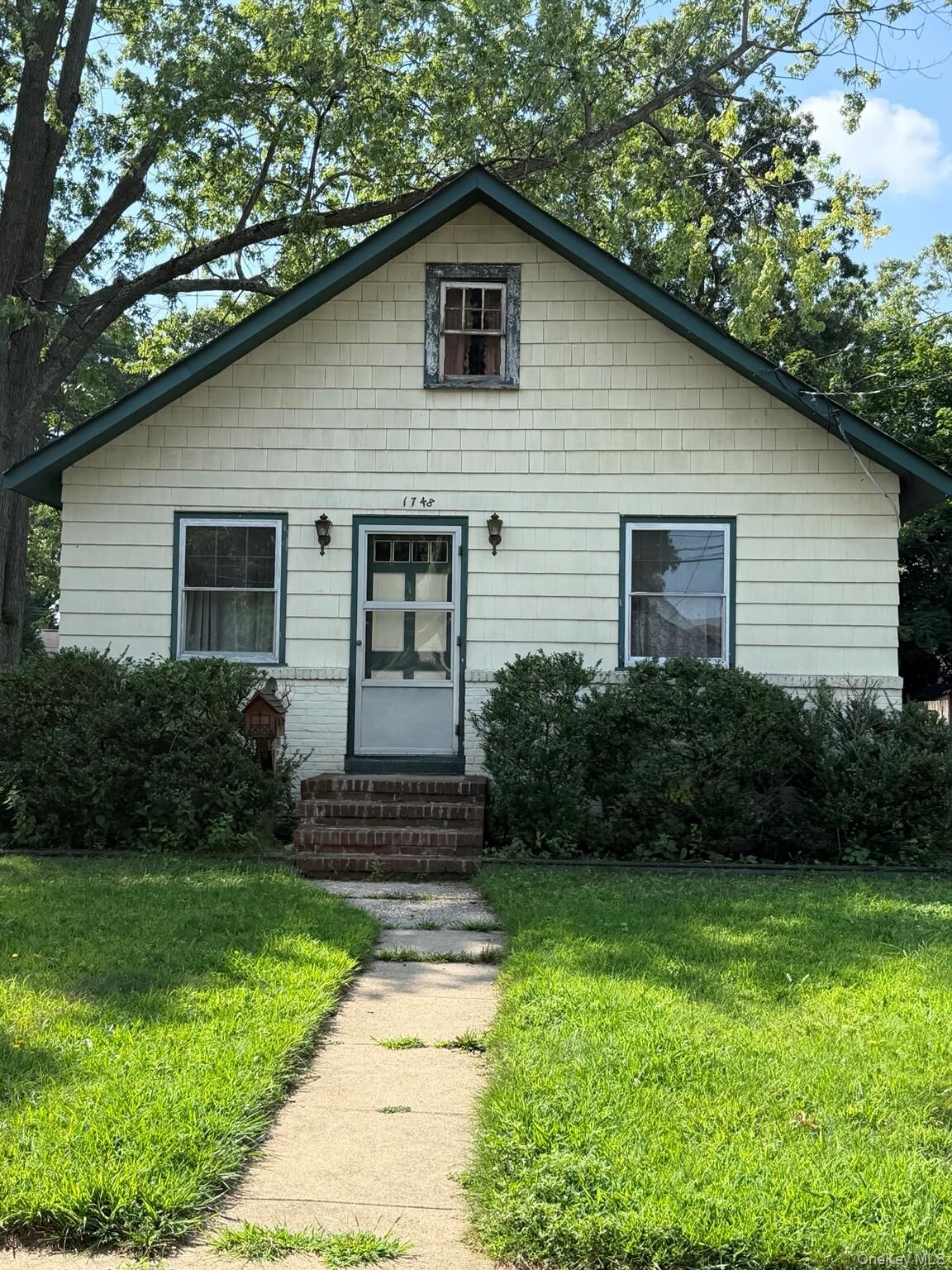 Property Photo:  1748 Carroll Avenue  NY 11566 