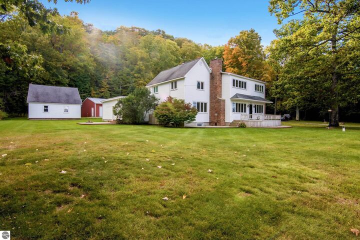 Property Photo:  9838 Peninsula Drive  MI 49686 