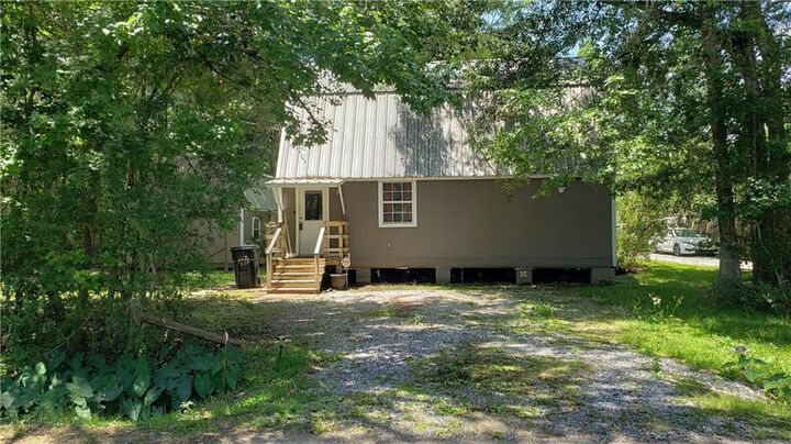 Property Photo:  73211 Plantation Street A  LA 70435 