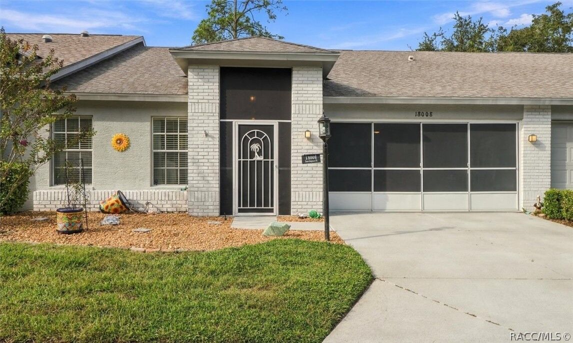 Property Photo: 18008 Tarrington Place FL 34667