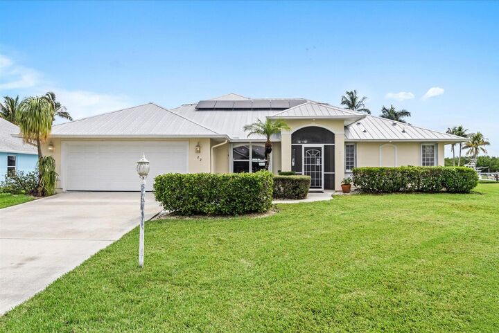 Property Photo: 122 Queen Frederika Court FL 34949