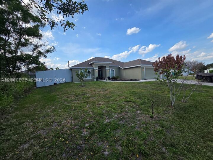 Property Photo:  1005 SW Bay State Rd  FL 34953 