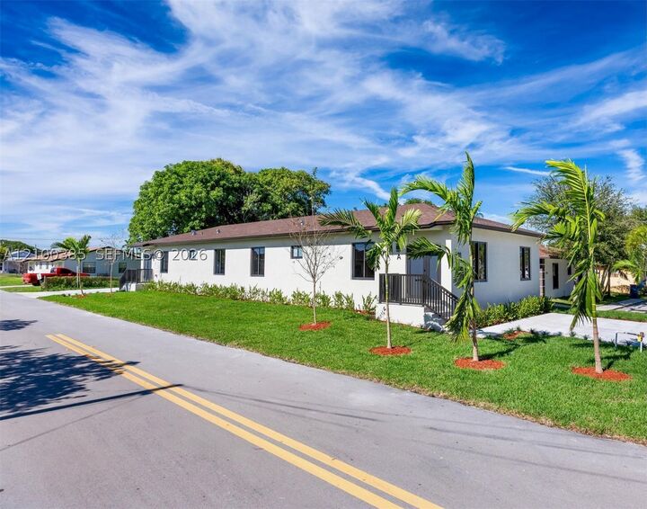 Property Photo:  601 NW 3rd Ave A  FL 33009 
