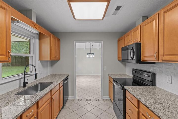 Property Photo:  410 Melbourne Dr  AL 36330 