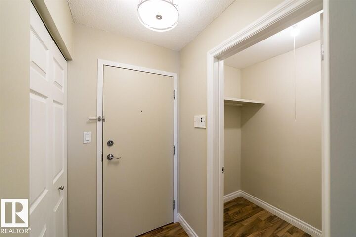 Property Photo:  12223 82 Street NW 203  AB T5B 2W9 