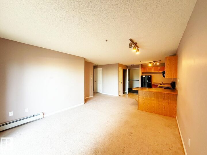 Property Photo:  #224 2305 35A  Avenue Northwest NW #224  AB T6T 1Z2 