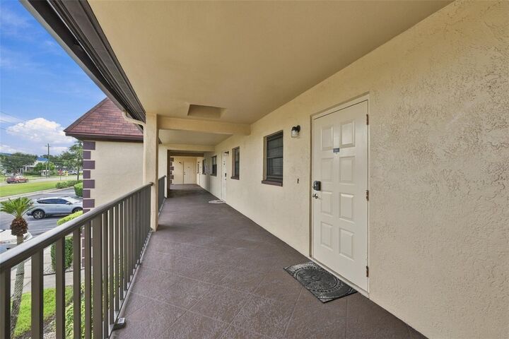 Property Photo:  12900 Vonn Road E204  FL 33774 