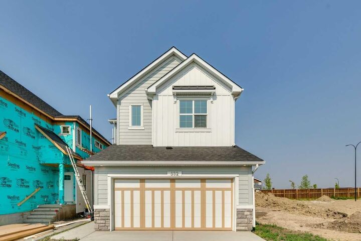 Property Photo:  532 Buffaloberry Manor SE  AB T3M 4G6 