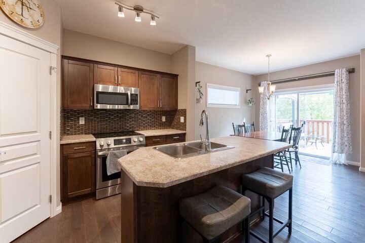 Property Photo:  306 Twinriver Road W  AB T1J 5B9 