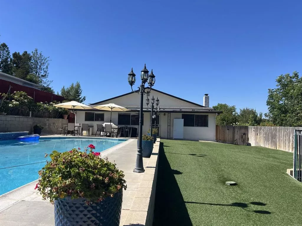 Property Photo:  9040 Paradise Park Dr  CA 92040 