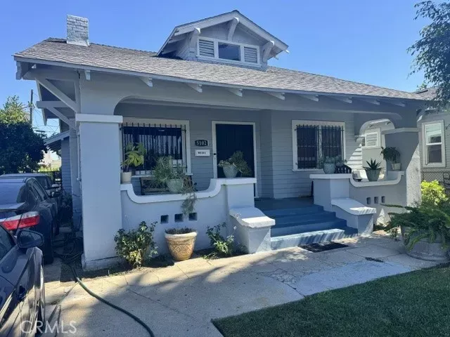 Property Photo:  5102 Cimarron  CA 90062 