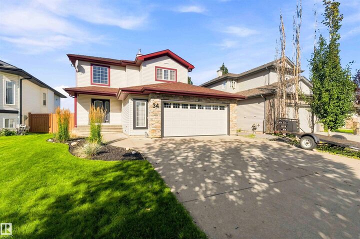 Property Photo:  34 Norris Crescent  AB T8N 7M4 