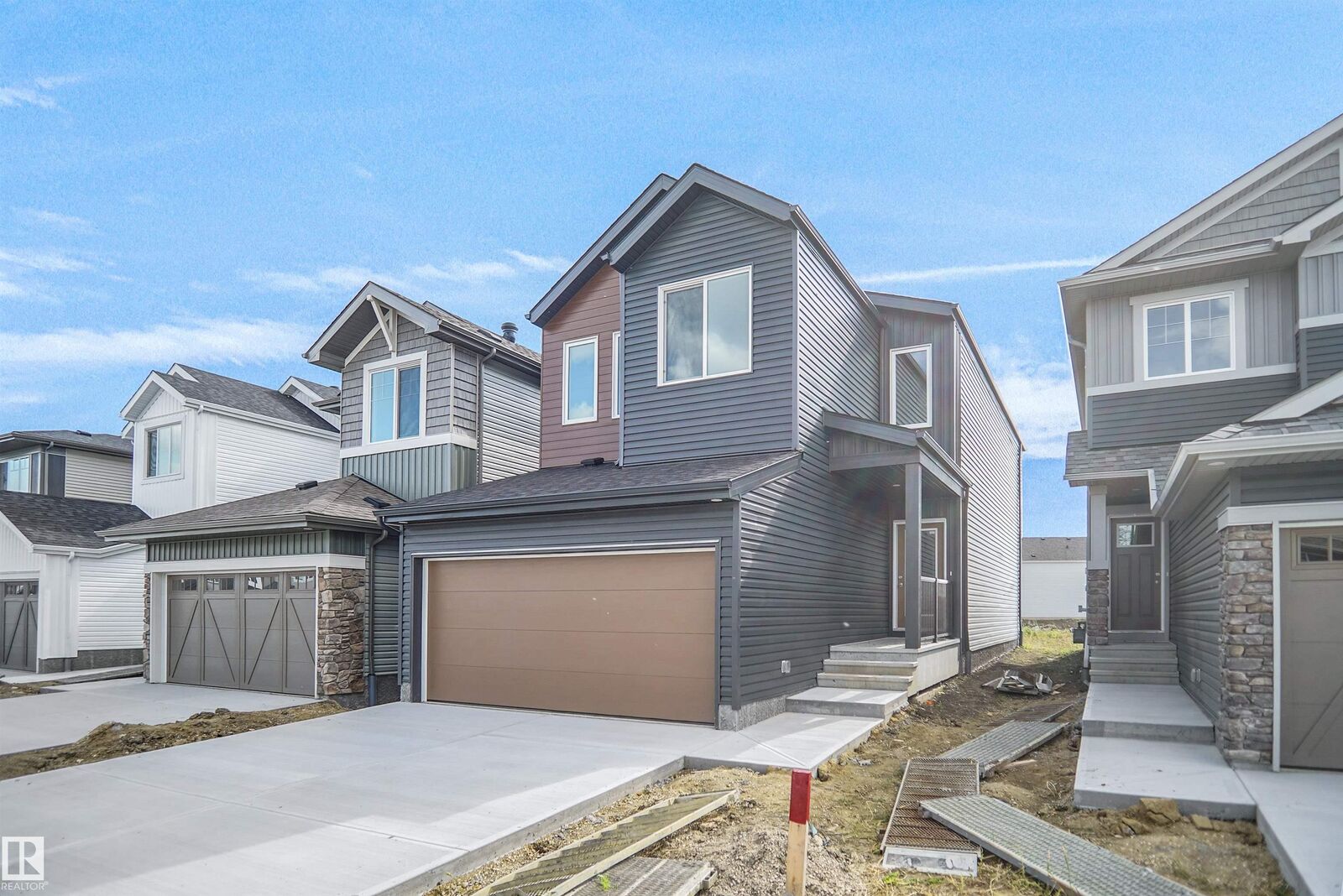 Property Photo: 206 Elliot Wynd AB T8L 0Z6