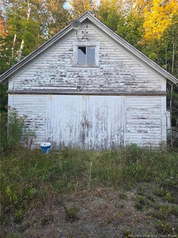 Property Photo:  65 Main Street  NB E6H 1L2 