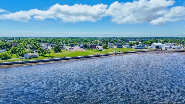 Property Photo:  204 Jd Gauthier Boulevard  NB E8S 1P3 
