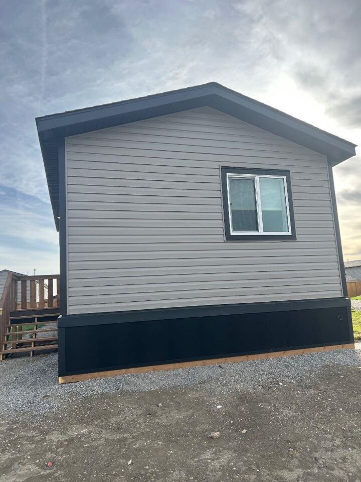Property Photo:  2050 Sunflower Crescent  AB T1M 0G4 