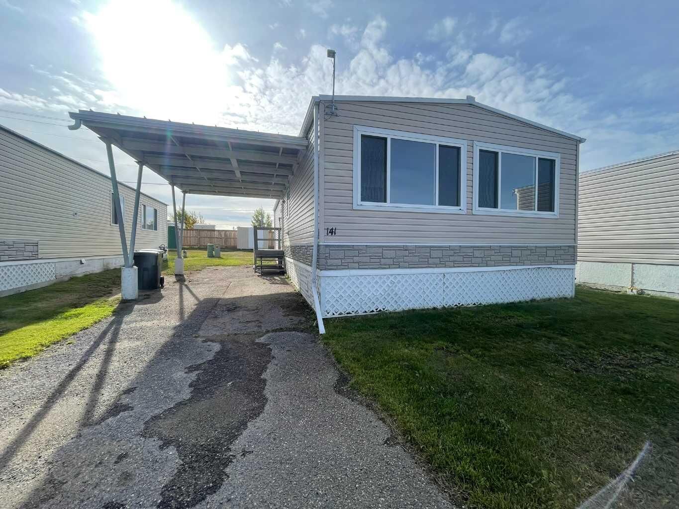 Property Photo:  5308 57 Street 141  AB T9V 2A3 