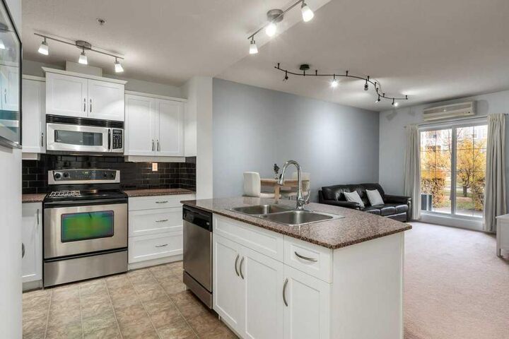 Property Photo:  5605 Henwood Street SW 1302  AB T3E 7R2 