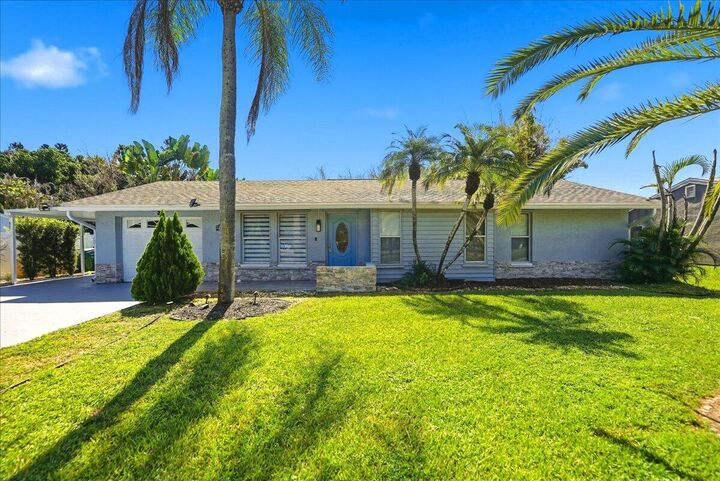 Property Photo: 2031 SE New York Street FL 34952
