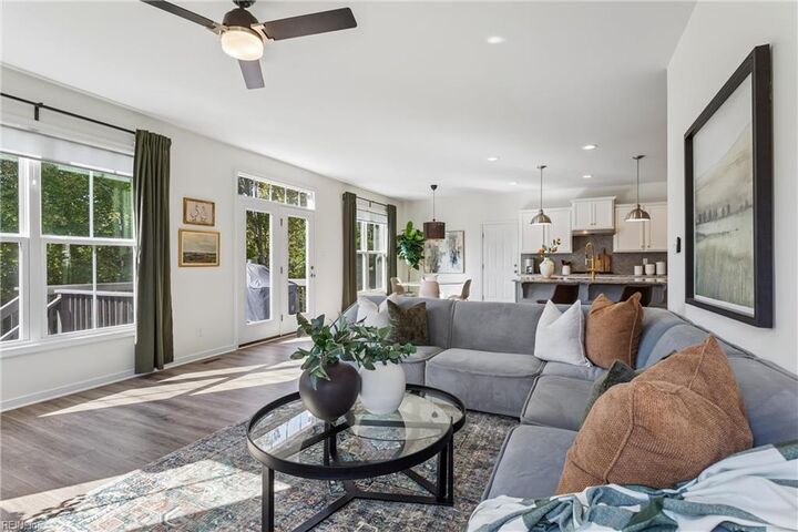 Sunlit family room open to the kitchen