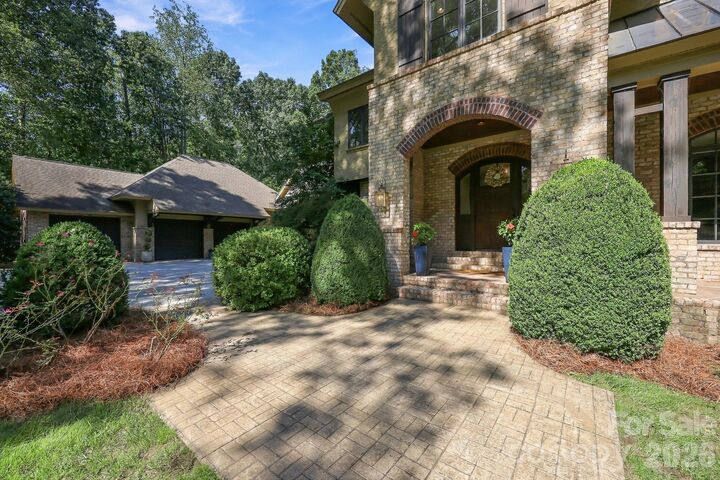 Property Photo:  115 Saddle Creek Court  NC 28036 