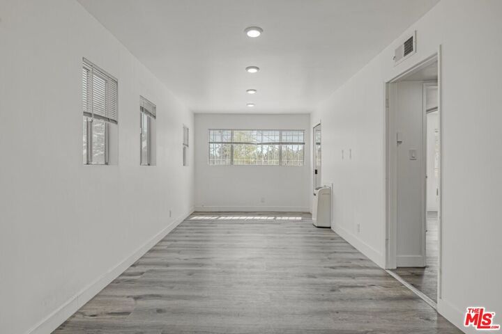Property Photo:  124 S Almont Dr, Unit 1  CA 90211 