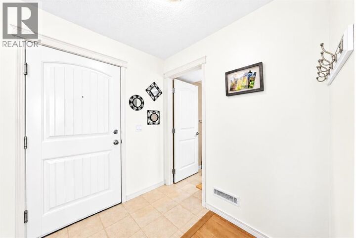 Property Photo: 115 Prestwick Villas Southeast AB T2Z 0M7